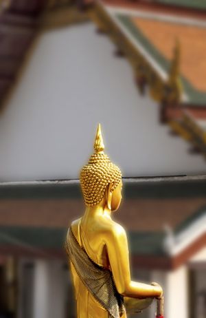 Golden Statue at Temple of Dawn Bangkok 